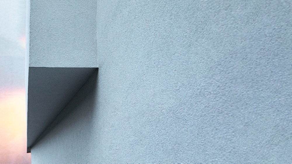 is stucco cheaper than siding