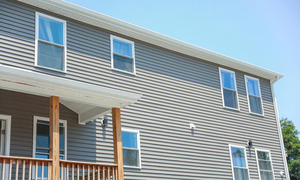 is stucco cheaper than siding